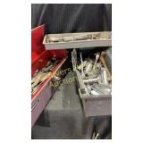 Two toolboxes filled with assorted tools