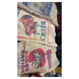 Assortment of five printed burlap sacks