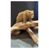 J. L. Clark hand carved grizzly bear on drift