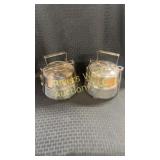 Two stainless steel 2-tier tiffin carriers