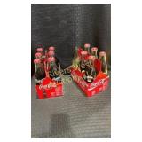 Two 6 packs of Coca-Cola classic glass bottles