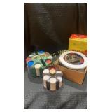 Assortment of plastic poker chips and racks