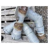 Assortment of 4' fittings and a bucket with extras
