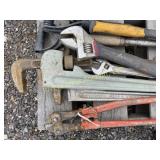 Assortment of large pipe  wrenches and tools