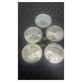 Five 2009 American Eagle Silver Dollars