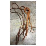 Two pairs of leather split reins