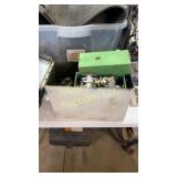 Ammo can full of small engine carburetors