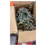 Chain fall hoist, and load chain in metal box
