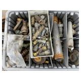 Tote full of brass and pipe fittings