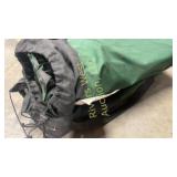 Two green folding cots