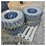 Set of four Used 29x9(11)-R14 tires and 4 holerims