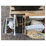 Crate and box full of plumbing supplies