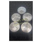 Five 2009 American Eagle Silver Dollars
