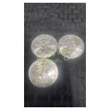 Three 2009 American Eagle Silver Dollars