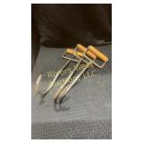 Three hay hooks
