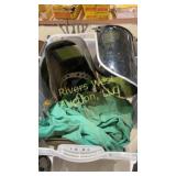 Tote full of torch, shields and goggles, arm,