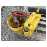 5 gal. bearing greaser and 5 gal diesel jug