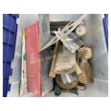 Tote full of concrete trowels and tools