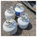 Four 20# propane tanks