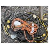 Large pile of extension cords