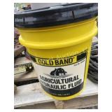 New 5 gal bucket of hydraulic fluid