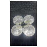 Four 2009 American Eagle Silver Dollars