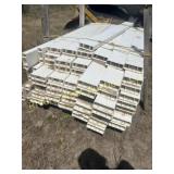 Approximately 60 pieces of vinyl plank fencing