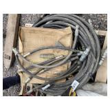 large pile of hydraulic hoses