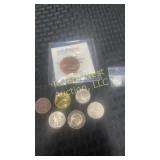 Assortment of coins and tokens