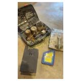 Assortment of drill indexes and hole saw cutting