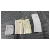 Four 5.56x45 metal Magazines of various sizes