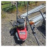 Troy built walk behind weed eater