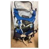 JanSport Whittaker kicking backpack