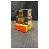 3 boxes of bullets. 1 box of Nosler bullets. 1
