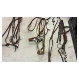 Assortment of headstalls and Hackamore