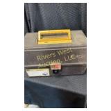 Tackle box filled with fishing lures and other