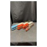 4 fishing weight/jig molds.