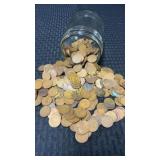 Jar full of wheat Pennieï¿½s from various years and