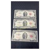 Three 1953 Series ï¿½Aï¿½ red ink two dollar bills