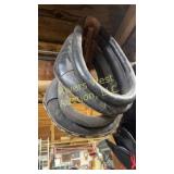 Two vintage pulling collars of various sizes and
