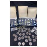 Assortment of uncirculated quarters from various