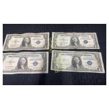 Four 1935 silver certificates