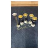 Sterling shot glasses with one candle stick