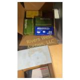 Two boxes of assorted brass