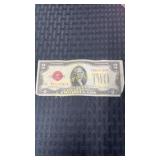 1928 ï¿½Gï¿½ two dollar bill in red ink
