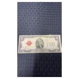 1928 series G two dollar bill in red ink