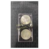 Two Canadian silver dollars
