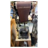 Belt sander on a stand