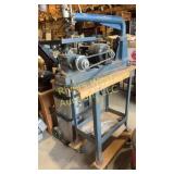 Cast Craftsman scroll saw SJ-30 on a rolling cart