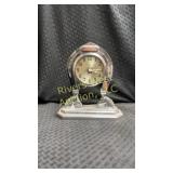 Vintage horseshoe analog clock.